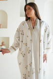 Elegant White Linen Abaya with Golden Embroidery